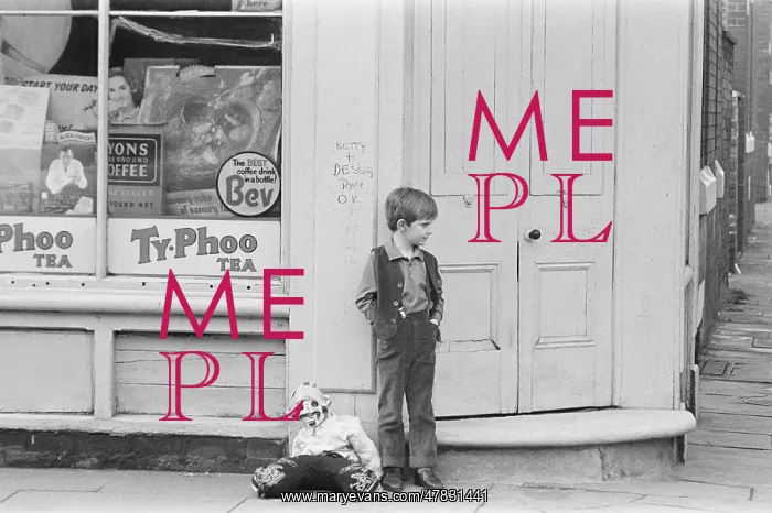  : Young boy outside shop with a guy