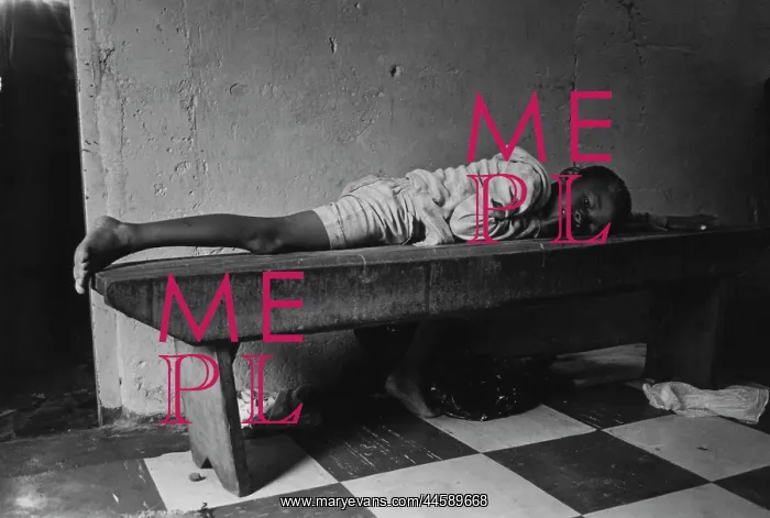: Young boy resting on a bench in Katlehong : Young boy resting on a bench in Katlehong