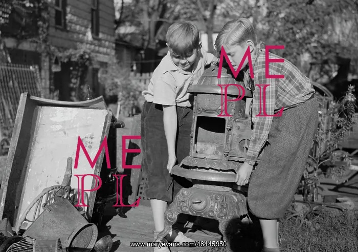 : Young children collecting scrap for donation : Young children collecting scrap for donation