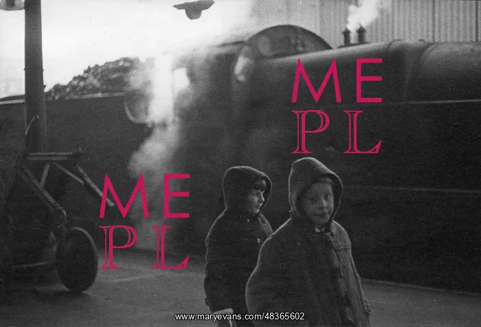 : Two young children in front of steam engine : Two young children in front of steam engine