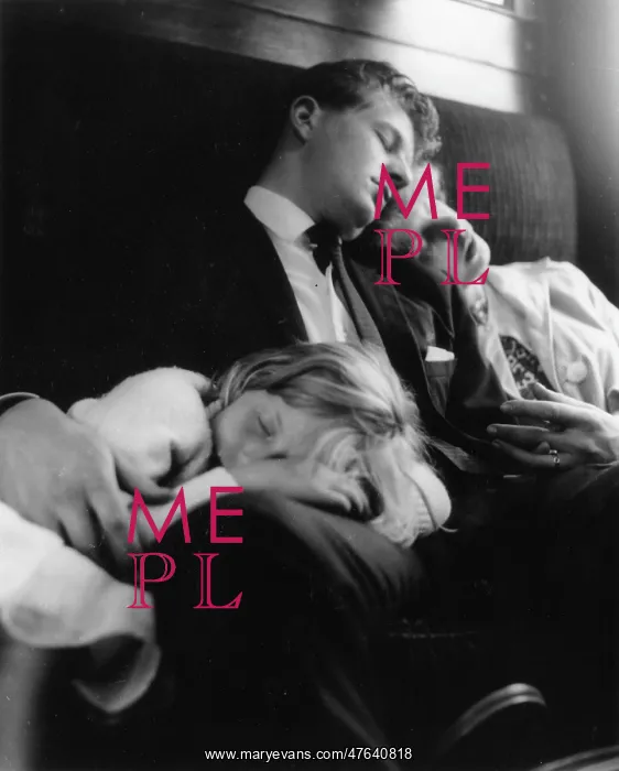  : Young couple and child sleeping in a train compartment