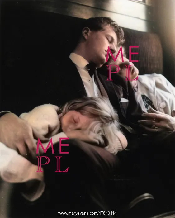  : Young couple and child sleeping in a train compartment