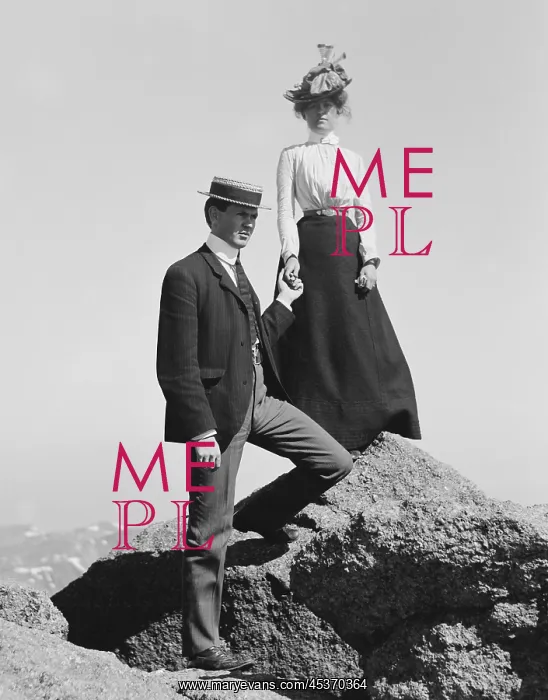 : Young couple holding hands while posed on : Young couple holding hands while posed on