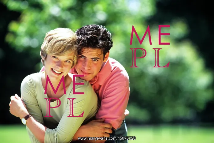: Young Couple Outdoors Looking at Camera Brunette Man : Young Couple Outdoors Looking at Camera Brunette Man