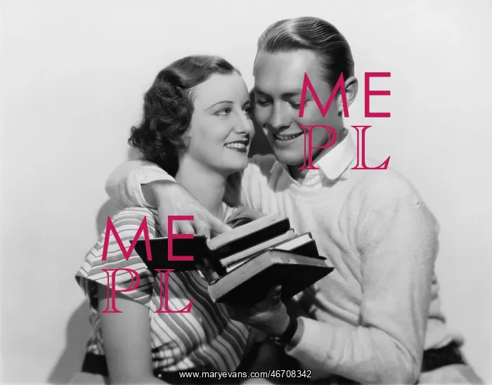 : Young couple study books together : Young couple study books together