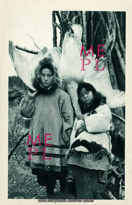 : Two young Eskimo (Inuit) children with a captured goose : Two young Eskimo (Inuit) children with a captured goose