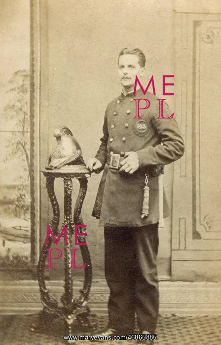 : Young fireman in studio photograph : Young fireman in studio photograph