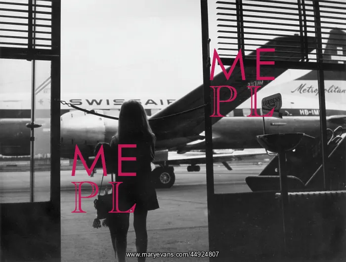 : Young girl at an airport : Young girl at an airport