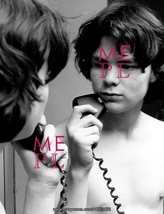  : Young lad using an electric razor