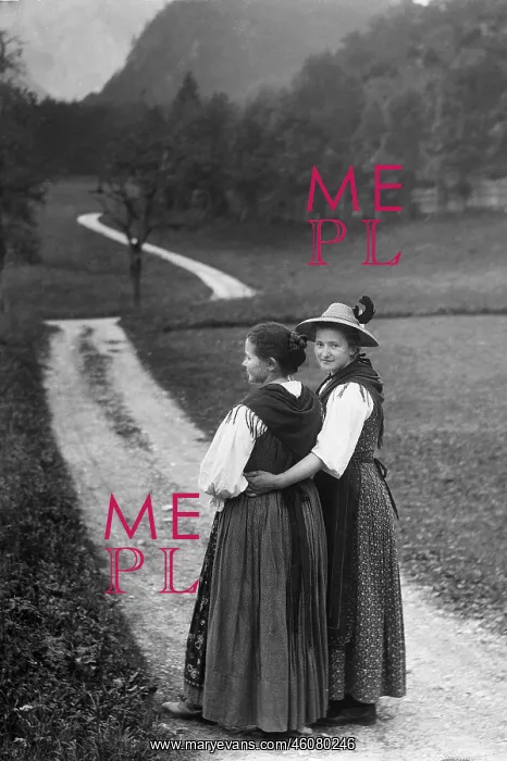 : Two young ladies in dirndl dresses : Two young ladies in dirndl dresses