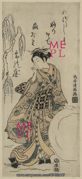 : Young lady making a snowball : Young lady making a snowball