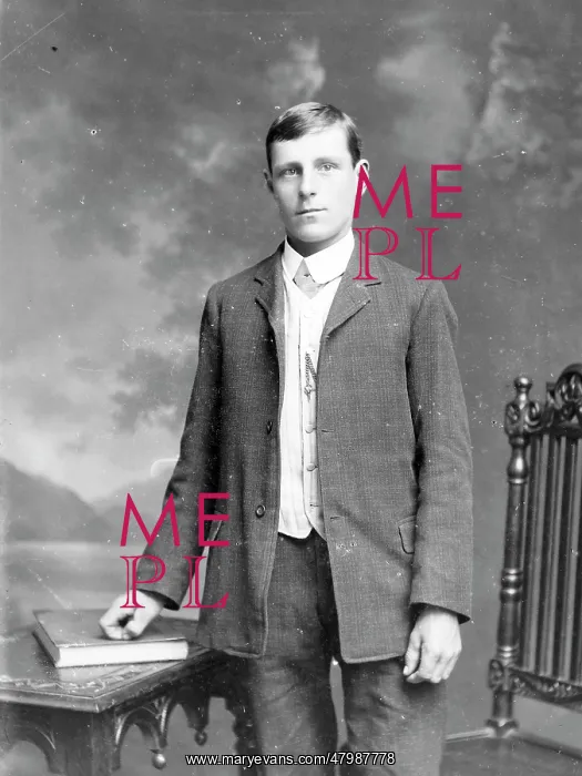 : Young man with book and table, Mid Wales : Young man with book and table, Mid Wales