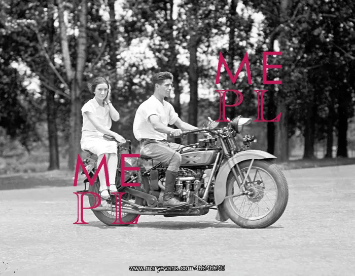 : A young man drives a motorcycle : A young man drives a motorcycle