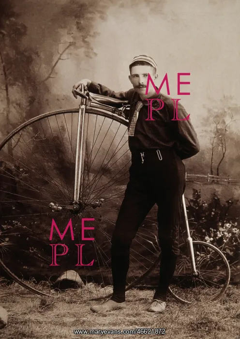 : Young man with a pennyfarthing bicycle : Young man with a pennyfarthing bicycle