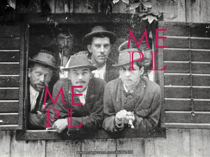 : Six young men - some with pipes - look Out of a : Six young men - some with pipes - look Out of a