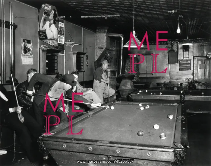 : Young men playing pool on a weeknight in Shelby : Young men playing pool on a weeknight in Shelby