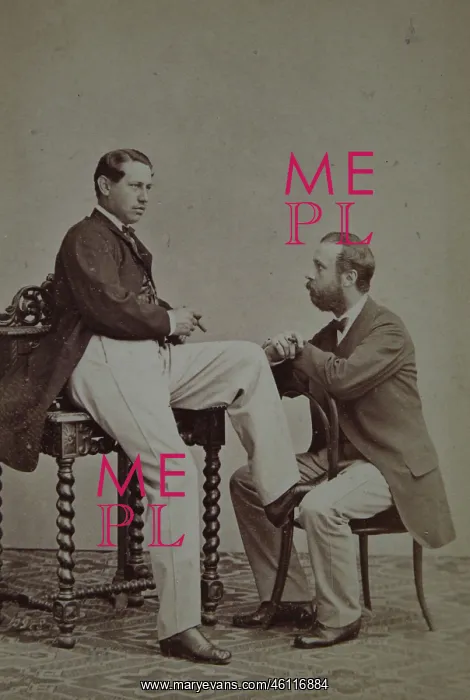 : Two young men one sitting on a Thonet : Two young men one sitting on a Thonet