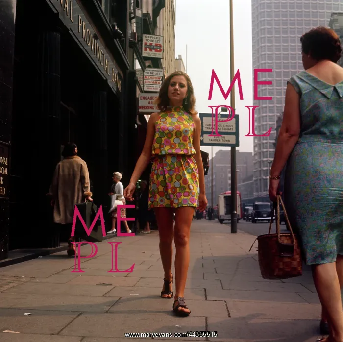 : Young model in flowery mini dress : Young model in flowery mini dress