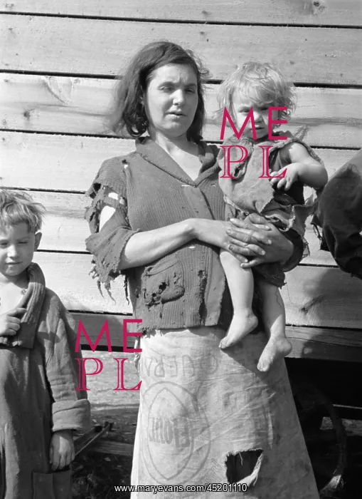 : Young mother dressed in a ragged sweater ? : Young mother dressed in a ragged sweater ?