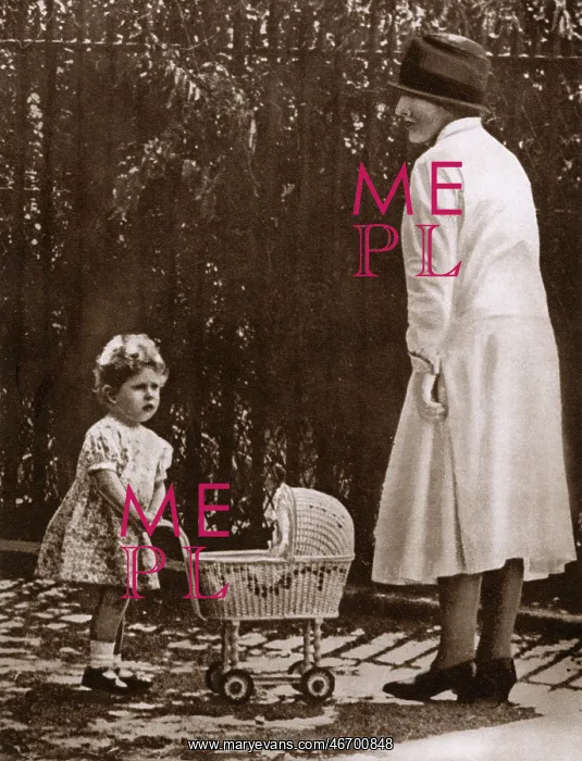 : Young Princess Elizabeth with her first toy pram : Young Princess Elizabeth with her first toy pram