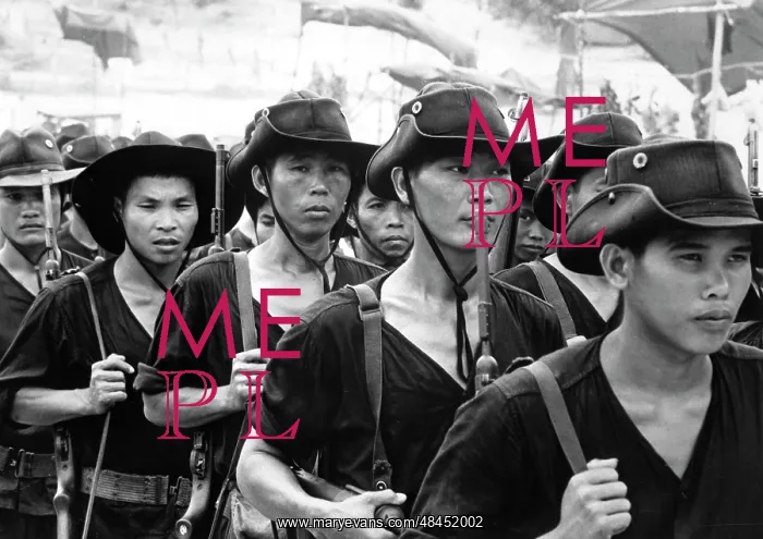 : Young Vietnamese men return to their native : Young Vietnamese men return to their native