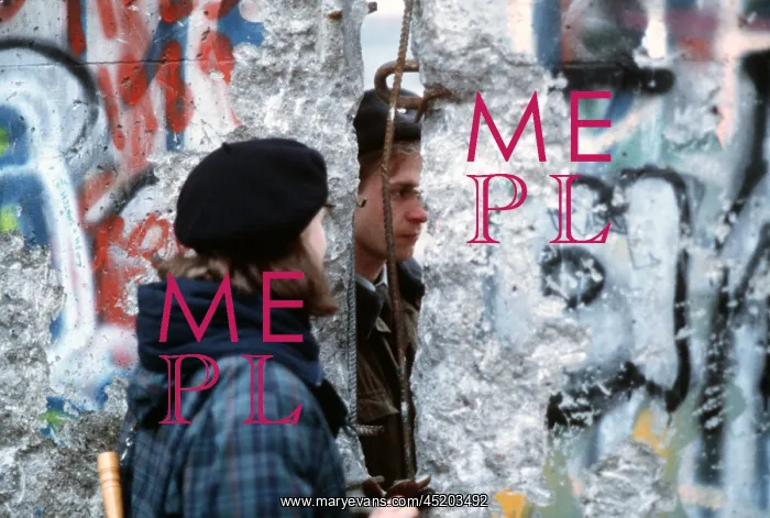 : A young West German woman speaks with an ? : A young West German woman speaks with an ?
