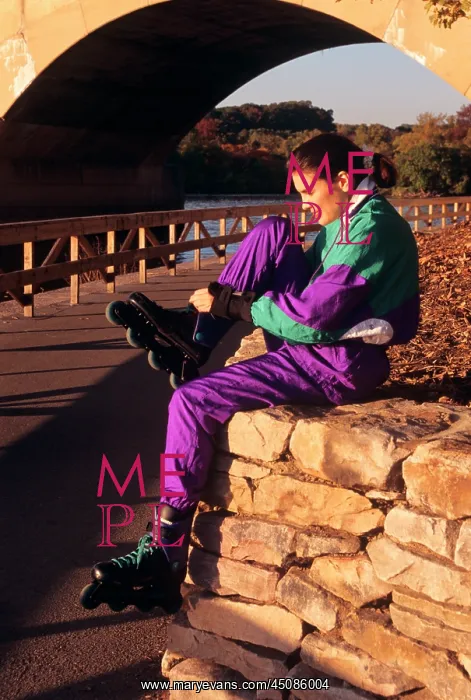 : Young Woman Adjusting Rollerblades in Fairmount : Young Woman Adjusting Rollerblades in Fairmount