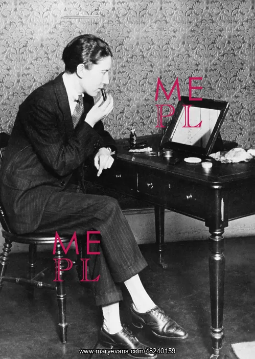 : Young woman applying makeup, 1927 : Young woman applying makeup, 1927
