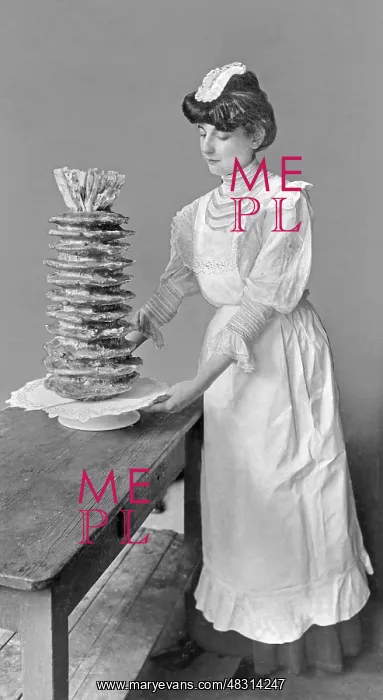 : A young woman has baked Baumkuchen, 1907 : A young woman has baked Baumkuchen, 1907
