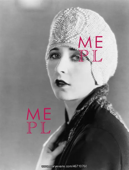 : Young woman in beaded cap : Young woman in beaded cap