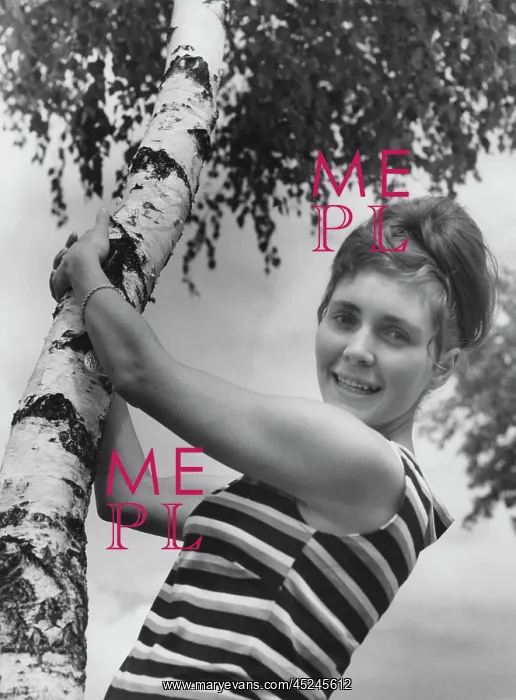 : Young woman at birch tree : Young woman at birch tree