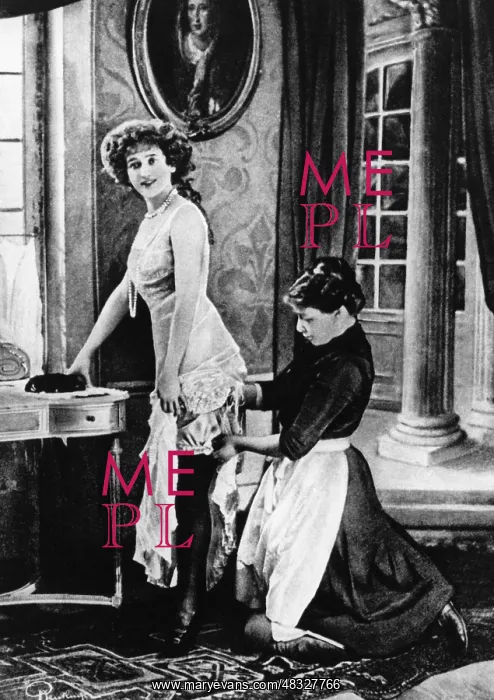 : Young woman dressing, 1921 : Young woman dressing, 1921