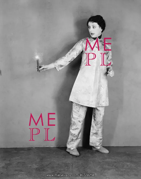 : Young woman holding a candle : Young woman holding a candle