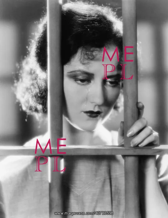 : Young woman in a jail, looking sad : Young woman in a jail, looking sad