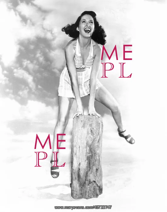 : Young woman jumping over a hurdle : Young woman jumping over a hurdle