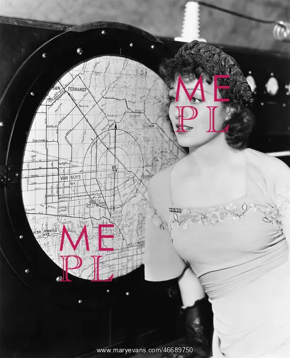 : Young woman looking at a radar : Young woman looking at a radar