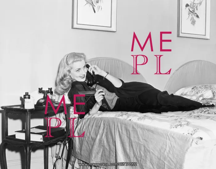 : Young woman lying on her bed in the bedroom and : Young woman lying on her bed in the bedroom and