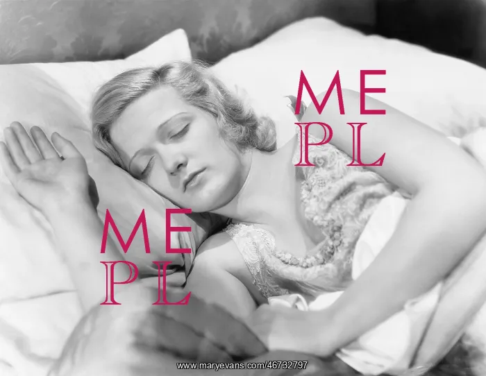  : Young woman lying in her bed sleeping