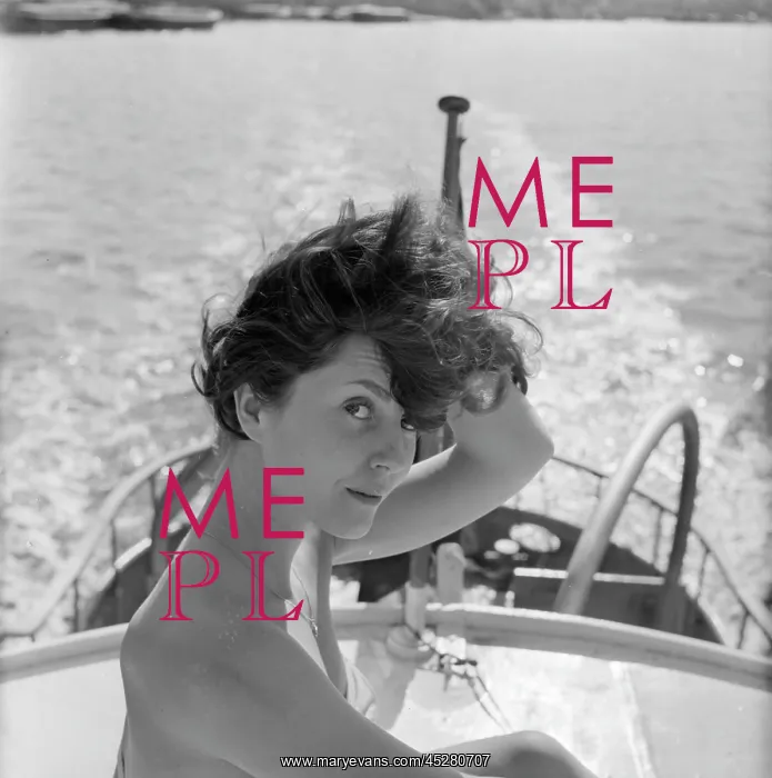 : Young woman modelling on a boat : Young woman modelling on a boat