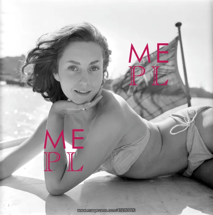 : Young woman modelling on a boat : Young woman modelling on a boat