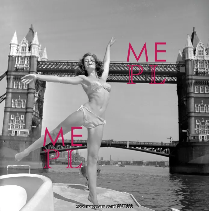 : Young woman modelling on a boat : Young woman modelling on a boat