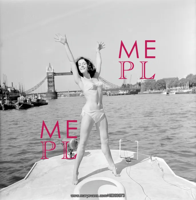 : Young woman modelling on a boat : Young woman modelling on a boat