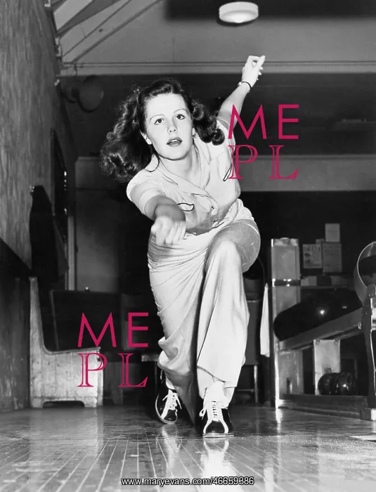 : Young woman playing bowling : Young woman playing bowling