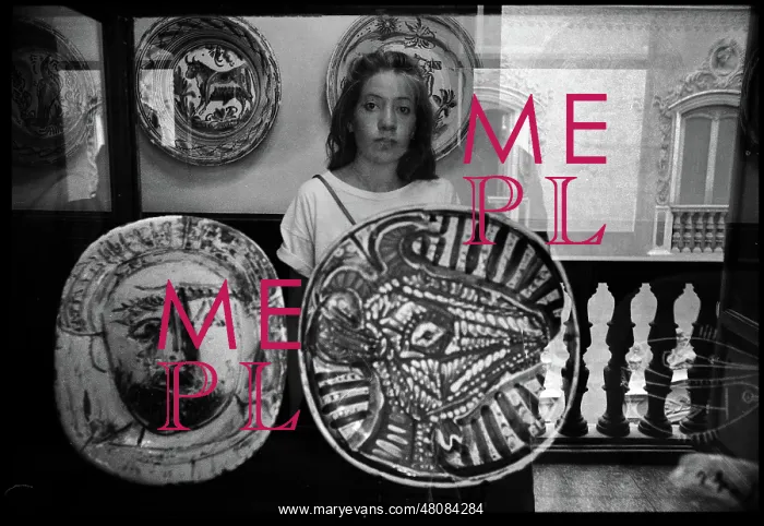 : Young woman reflected in case of Picasso ceramics, Valencia : Young woman reflected in case of Picasso ceramics, Valencia