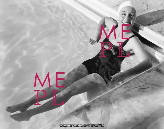 : Young woman relaxing in a pool : Young woman relaxing in a pool