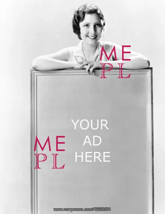  : Young woman standing behind a sign