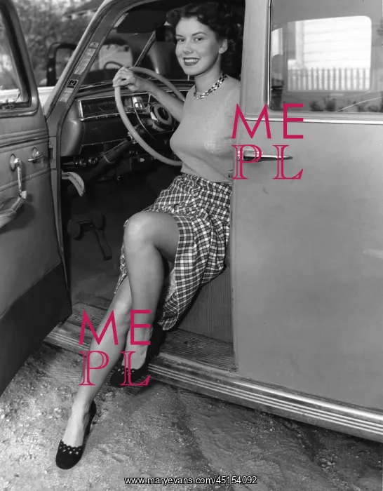 : Young Woman Stepping Out Of A Car : Young Woman Stepping Out Of A Car