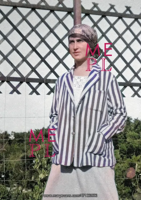 : Young woman in striped blazer : Young woman in striped blazer