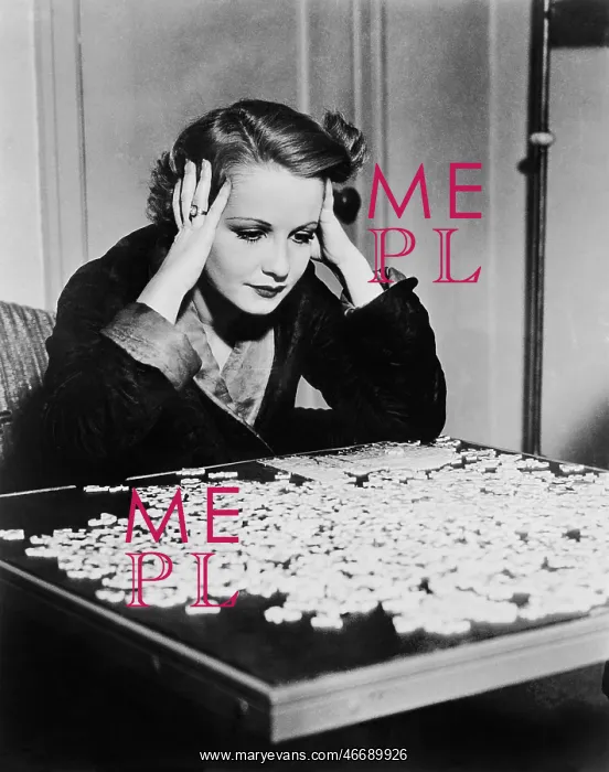  : Young woman trying to solve a puzzle