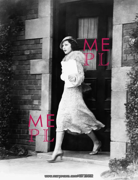  : Young woman walking out door